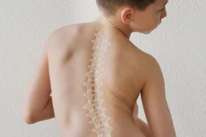 A child’s back with the spine highlighted